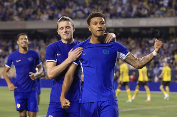 Chelsea players in their new kit without sponsors in the pre-season game against Dortmund.