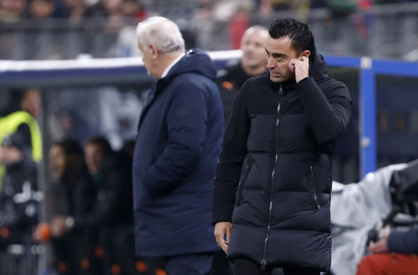 Xavi reacts during the UEFA Champions League match between FC Shakhtar Donetsk and FC Barcelona in Hamburg, northern Germany on November 7, 2023. (Photo by AXEL HEIMKEN/AFP via Getty Images)