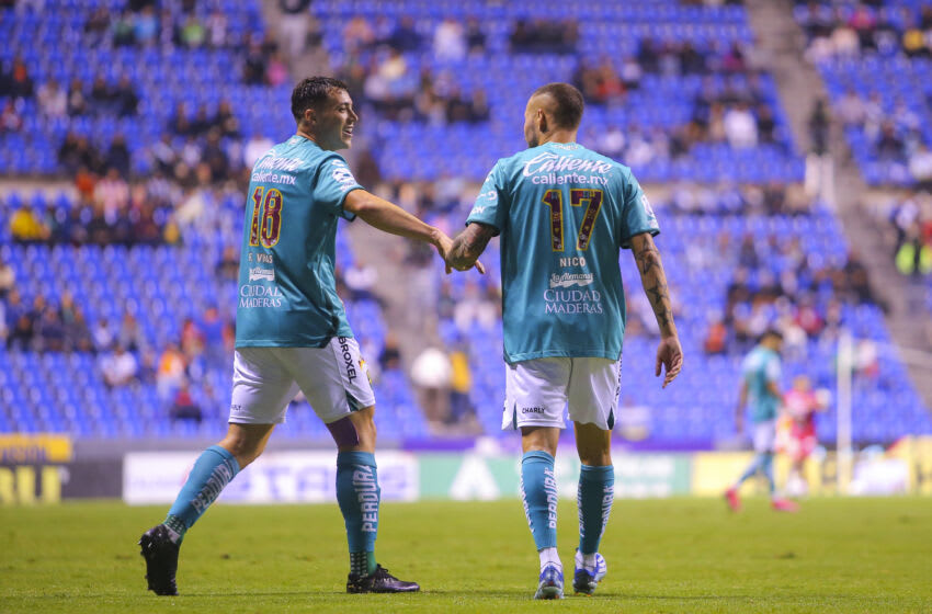 León fans hope to see Federico Viñas (left) and Nico López celebrating against FC Juárez on Sunday. A victory would give the Esmeraldas a spot in the Liga MX Play-In Tournament. (Photo by Agustin Cuevas/Getty Images)