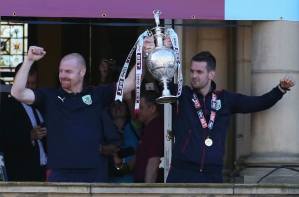 BURNLEY, ENGLAND - MAY 09: Sean Dyche manager of Burnley and captain Tom Heaton celebrate with the trophy as Sky Bet Champions Burnley are presented with the Championship trophy at the Town Hall on May 9, 2016 in Burnley, England. (Photo by Jan Kruger/Getty Images)