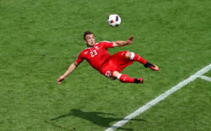 SAINT-ETIENNE, FRANCE - JUNE 25: Xherdan Shaqiri of Switzerland scores his team's first goal during the UEFA EURO 2016 round of 16 match between Switzerland and Poland at Stade Geoffroy-Guichard on June 25, 2016 in Saint-Etienne, France. (Photo by Alex Livesey/Getty Images)