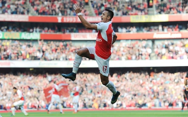 LONDON, ENGLAND - OCTOBER 04: Alexis Sanchez celebrates scoring the 1st Arsenal goal during the Barclays Premier League match between Arsenal and Manchester United at Emirates Stadium on October 4, 2015 in London, England. (Photo by Stuart MacFarlane/Arsenal FC via Getty Images)